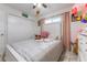 Bright bedroom featuring a large bed and a closet at 121 Lochness Ln, Kissimmee, FL 34743