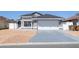 Charming single-Gathering home with a two-car garage and a well-manicured lawn at 121 Lochness Ln, Kissimmee, FL 34743