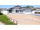 Beautiful single-Gathering home with a spacious driveway and a well-manicured lawn at 121 Lochness Ln, Kissimmee, FL 34743