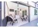 Enjoy your outdoor living space with this covered patio perfect for relaxing at 121 Lochness Ln, Kissimmee, FL 34743