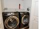 Laundry room featuring front-load washer and dryer at 127 Club Villas Ln, Kissimmee, FL 34744
