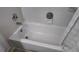Simple and clean bathroom with white tub and chrome fixtures at 15106 Sw 38Th Cir, Ocala, FL 34473