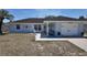 Charming single-story home with well-manicured lawn, a two-car garage, and welcoming front porch at 15106 Sw 38Th Cir, Ocala, FL 34473