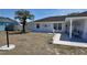 Charming single Gathering home featuring a one-car garage and well maintained lawn and landscaping at 15106 Sw 38Th Cir, Ocala, FL 34473