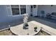 A landscaped garden featuring an angel statue and lush vegetation adorns the front yard at 15106 Sw 38Th Cir, Ocala, FL 34473