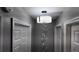 Hallway featuring modern drum lighting and decorative wall art at 15106 Sw 38Th Cir, Ocala, FL 34473