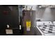 Close-up of water heater, furnace, and laundry equipment at 15106 Sw 38Th Cir, Ocala, FL 34473