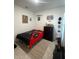 This stylish room features a game-themed decor, a comfortable bed, and matching furniture at 15954 Sw 55Th Avenue Rd, Ocala, FL 34473
