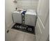 Convenient laundry area with a washer, a dryer, and storage space for laundry supplies at 15954 Sw 55Th Avenue Rd, Ocala, FL 34473