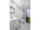 Modern bathroom features a shower, sleek vanity and contemporary fixtures at 18806 Monroe Ave, Orlando, FL 32820