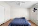 Cozy bedroom with ceiling fan and natural light from the window makes this a great place to rest at 18806 Monroe Ave, Orlando, FL 32820