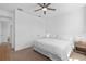 Bright bedroom with a ceiling fan, carpet and white color scheme creates a peaceful and relaxing atmosphere at 19283 Allium Pl, Orlando, FL 32827