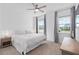 Bright bedroom featuring large windows and neutral decor at 19283 Allium Pl, Orlando, FL 32827