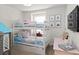 Charming bedroom with bunk beds, colorful decor, and a cozy play area at 1995 Majorca Dr, Kissimmee, FL 34747