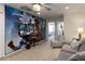 Spacious game room includes a large TV, comfortable seating, and themed decor at 1995 Majorca Dr, Kissimmee, FL 34747