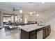 Open-concept kitchen with a granite island and seamless flow into living spaces at 1995 Majorca Dr, Kissimmee, FL 34747