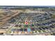 Comprehensive aerial view of a large-scale residential development, displaying organized streets and a developing community at 2059 Dexter St, Haines City, FL 33844