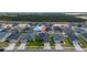Aerial shot of a residential neighborhood showcasing well-maintained homes, green spaces, and a Gathering-friendly community layout at 2059 Dexter St, Haines City, FL 33844