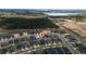 Neighborhood aerial view of modern homes near wooded area and waterfront at 2059 Dexter St, Haines City, FL 33844