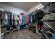 Spacious walk-in closet featuring ample storage with shelving and hanging rods at 2059 Dexter St, Haines City, FL 33844