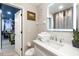 Bright bathroom featuring a white vanity with plenty of storage and modern fixtures at 2735 Lido Key Dr, Kissimmee, FL 34747