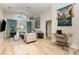 Stylish living room with vaulted ceiling, backyard view, and elegant furniture at 2735 Lido Key Dr, Kissimmee, FL 34747