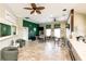 Inviting lounge area with comfortable seating, ceiling fans, and tropical-themed decor at 2735 Lido Key Dr, Kissimmee, FL 34747