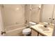 Well lit bathroom featuring a sink and vanity, toilet and combination bathtub and shower at 2781 King Oak Cir, St Cloud, FL 34769