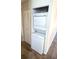 A stackable washer and dryer laundry closet is located in the home at 2781 King Oak Cir, St Cloud, FL 34769