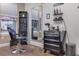 Barber shop includes chair, supplies, mirror, and storage shelves at 2903 Edenshire Way # 103, Kissimmee, FL 34746
