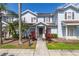 Charming townhome with a landscaped front yard and covered entrance at 2903 Edenshire Way # 103, Kissimmee, FL 34746