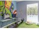 ' game room with video game consoles, bean bag chairs, and castle wall decal at 2903 Edenshire Way # 103, Kissimmee, FL 34746