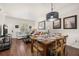 Spacious living room with dining area and decor lighting at 2903 Edenshire Way # 103, Kissimmee, FL 34746