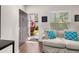 Cozy living room with comfortable sofa and view to entrance at 2903 Edenshire Way # 103, Kissimmee, FL 34746