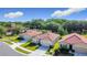 Desirable community with homes featuring tile roofs, manicured lawns, and convenient attached garages at 3105 Sangria St, Kissimmee, FL 34744