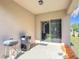 Outdoor patio with sliding glass doors, perfect for grilling and relaxation at 3105 Sangria St, Kissimmee, FL 34744