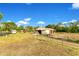 Exterior of barn and surrounding landscape, perfect for horse and livestock at 3255 Tucker Ave, St Cloud, FL 34772