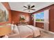 Bedroom with a large window, and ceiling fan at 3255 Tucker Ave, St Cloud, FL 34772