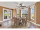Bright dining area with large bay windows and views of the back yard at 3255 Tucker Ave, St Cloud, FL 34772