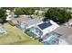 Aerial view of houses with solar panels at 334 Grosvenor Loop, Davenport, FL 33897