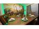 Formal dining room featuring a beautiful mural at 334 Grosvenor Loop, Davenport, FL 33897