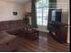 Inviting living room showcasing cozy seating and large windows at 334 Grosvenor Loop, Davenport, FL 33897