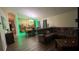 Open-concept living room connected to dining area, perfect for entertaining at 334 Grosvenor Loop, Davenport, FL 33897