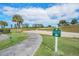 Scenic golf course view with lush greenery and a well-maintained fairway on a sunny day at 3421 Capland Ave, Clermont, FL 34711
