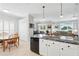 Bright kitchen featuring an island, a breakfast nook, and modern appliances at 3421 Capland Ave, Clermont, FL 34711