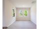 Bright bedroom with windows and tile flooring at 348 Conway Ave, St Cloud, FL 34771