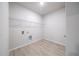 Walk-in closet with neutral wall color, neutral flooring, and wire shelving at 348 Conway Ave, St Cloud, FL 34771