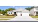 Charming single-Gathering home featuring a two-car garage, stone accents, and well-maintained lawn at 348 Conway Ave, St Cloud, FL 34771