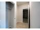 Hallway with neutral wall color, neutral flooring, and closet at 348 Conway Ave, St Cloud, FL 34771