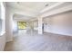 Spacious living room featuring tile floors and sliding glass doors at 348 Conway Ave, St Cloud, FL 34771